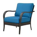 Polyrattan-Sessel mit blauem Kissen